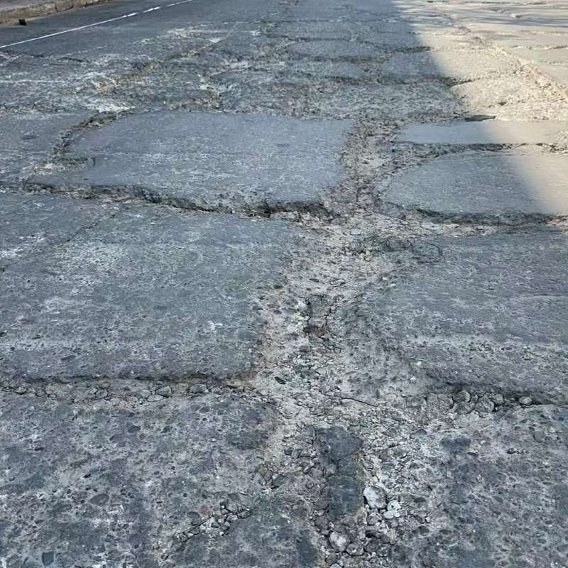 德庆路面起砂露石子修补料